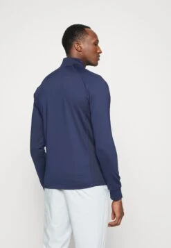 Lacoste Sport Golf Quarter Zip - Longsleeve - Bleu Marine -Golfserie Winkel a7551728e8404a0ca36db742bf036159