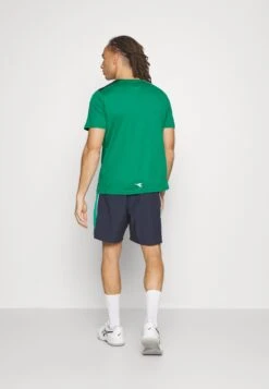 Diadora Core - Sport T-Shirt - Golf Green -Golfserie Winkel dac82b31645a478ebc957bf804d280d5